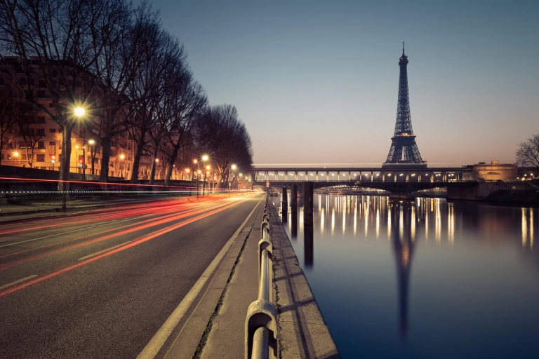 Stunning view of the Eiffel Tower with the Seine River in Paris, capturing the beauty of the iconic landmark and scenic river."