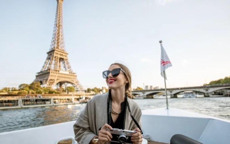 Scenic Seine River journey in Paris, showcasing the beauty of the river with iconic Paris landmarks